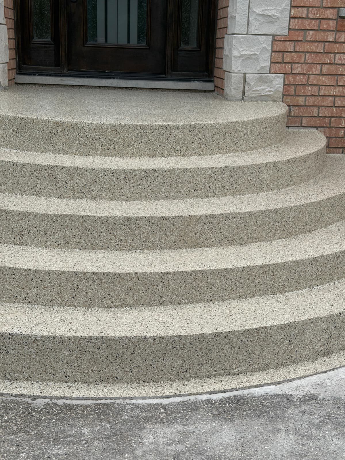 Close-up of flake-coated front steps